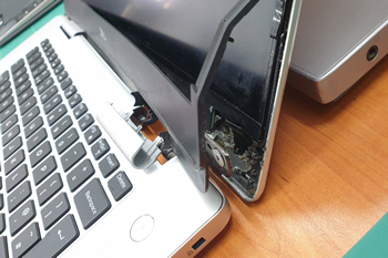 A damaged Windows laptop hinge and screen is something we repair at RescueTECH